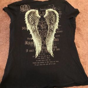 Angel winged top